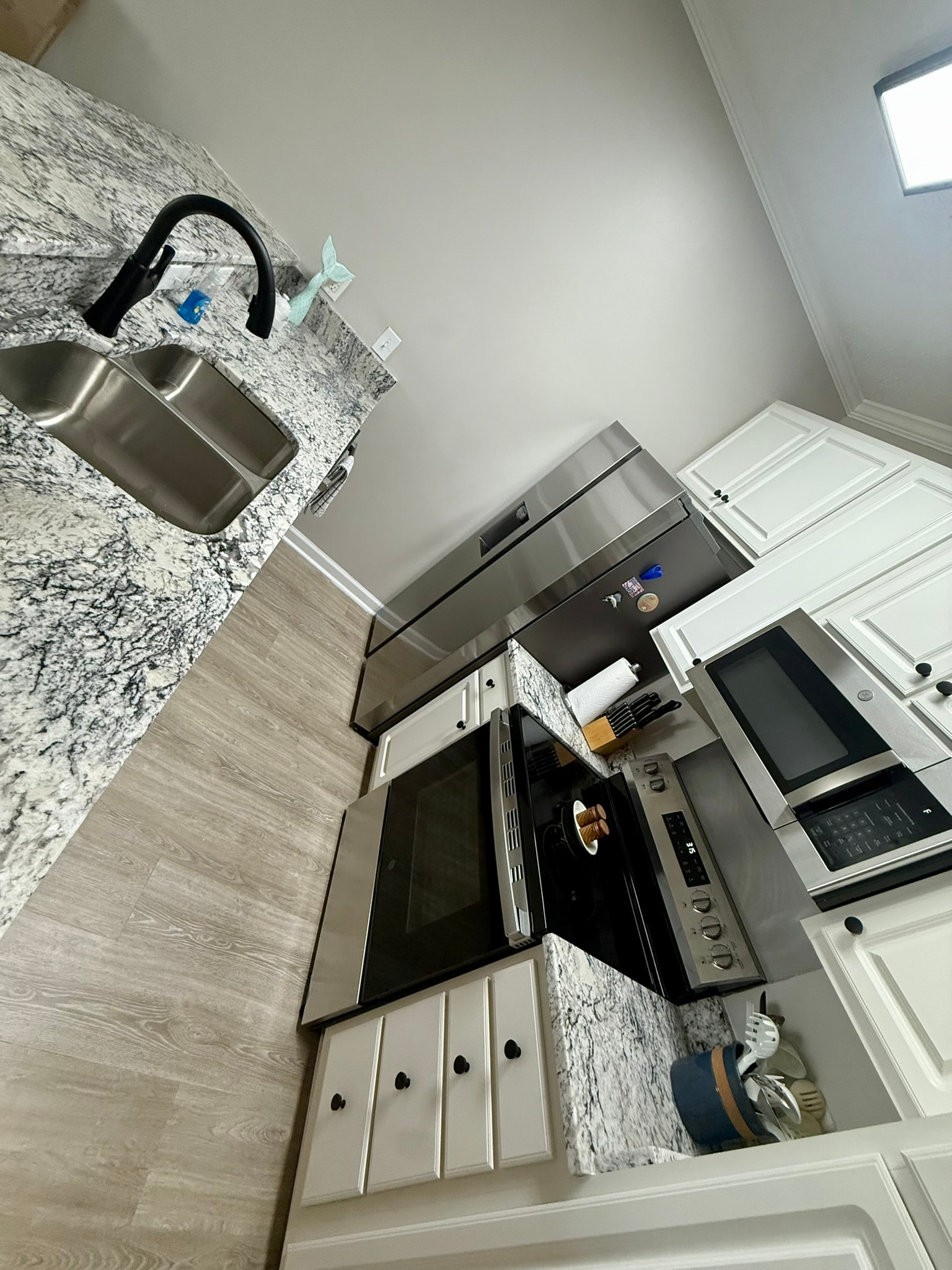 Kitchen with granite countertops and stainless appliances
