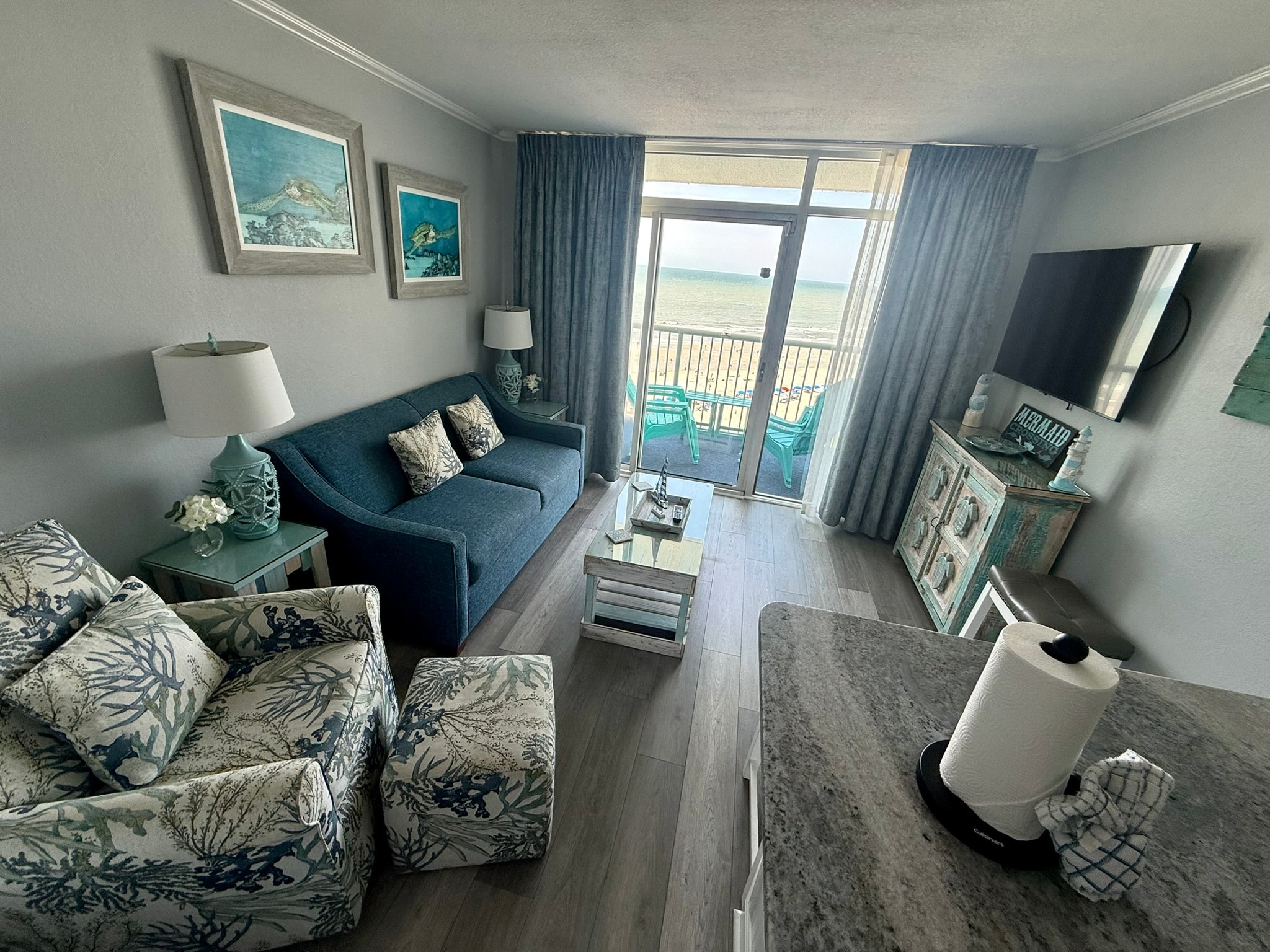 Living room with ocean view balcony